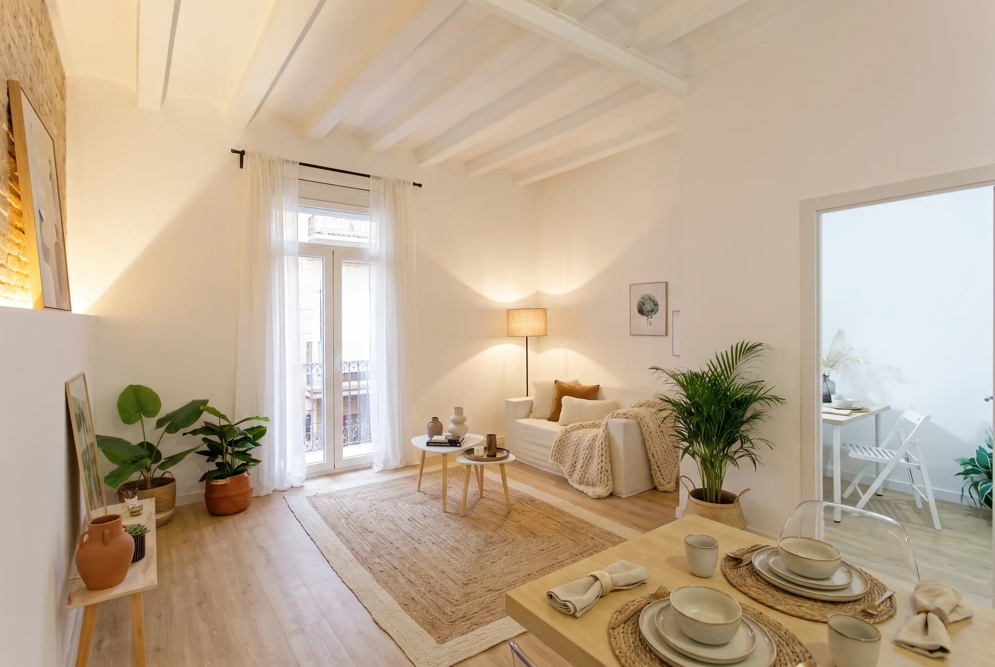 Salón comedor · Balcón después del home staging